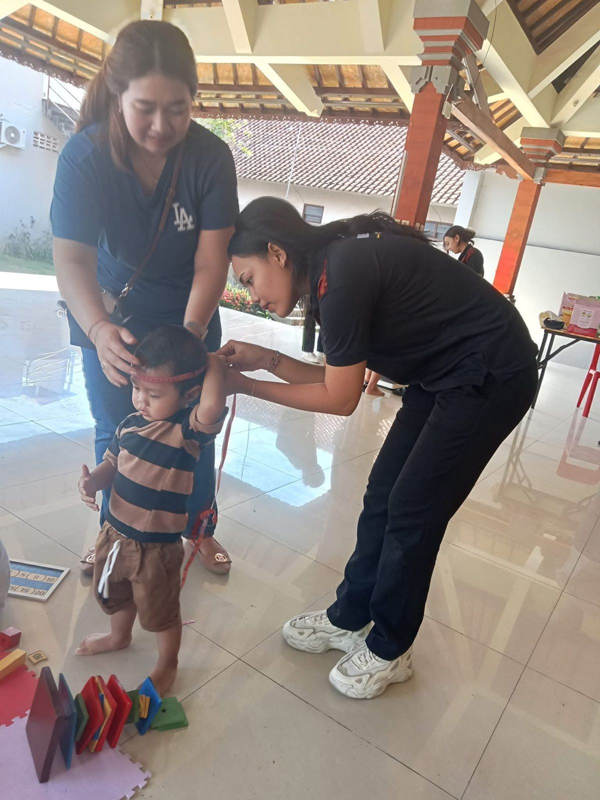 Posyandu Balita di Abian Kapas Kelod: Pemantauan Kesehatan, Pemberian PMT, dan Edukasi Kesehatan