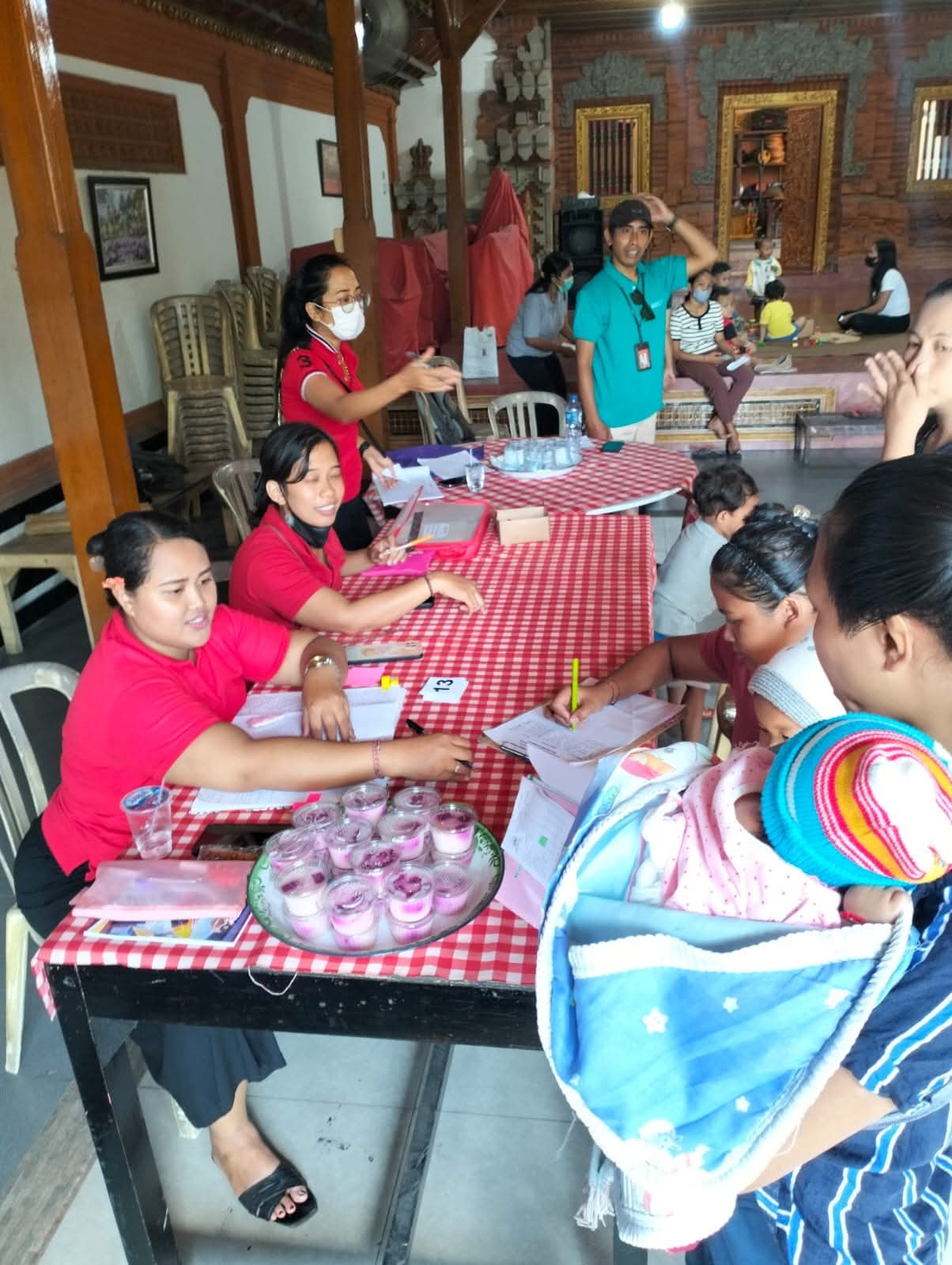 Posyandu balita yang dirangkaikan dengan  pemberian makanan tambahan (PMT) di Lingkungan Ketapian Ke
